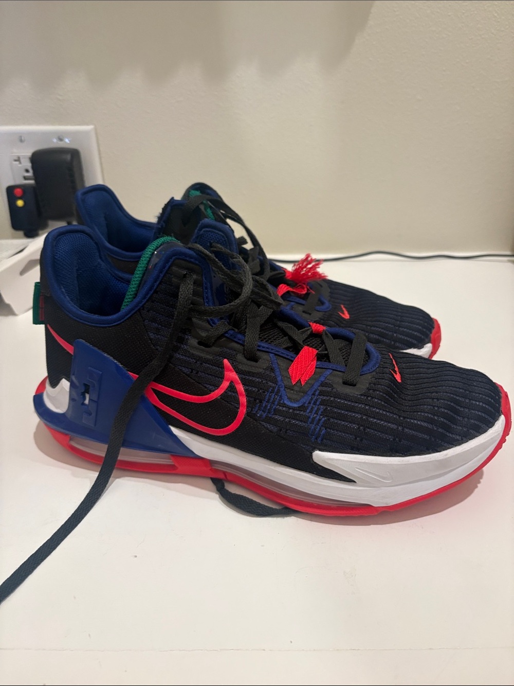 LeBron Witness 6 Black court shoes with Hot Pink & Blue Accents